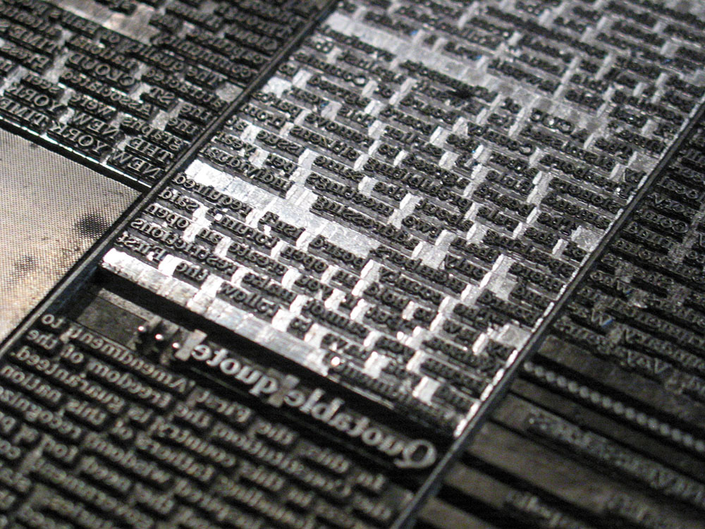Metal type for a newspaper page.